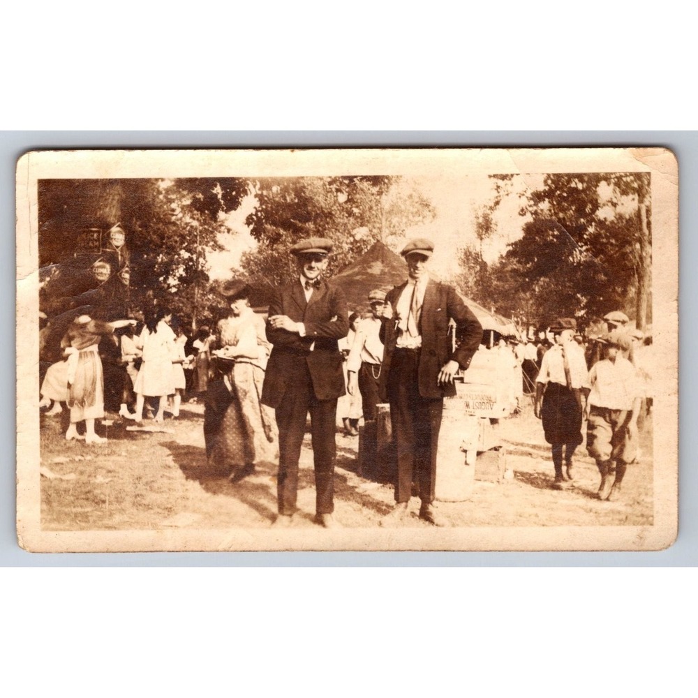 Outdoor Event 1920s Snapshot Photograph Two Men Suits Hats Crowd Sepia